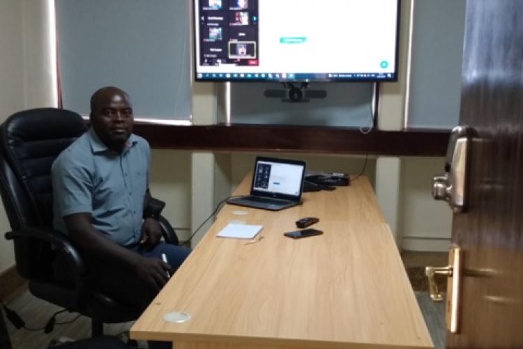 Dr. Onono attending a HORN online meeting on 14th February 2022 in the modern teleconference room at PHPT. The facility has been put up by the HORN project.